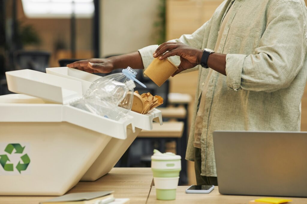African-American Man Recycling Paper Cup